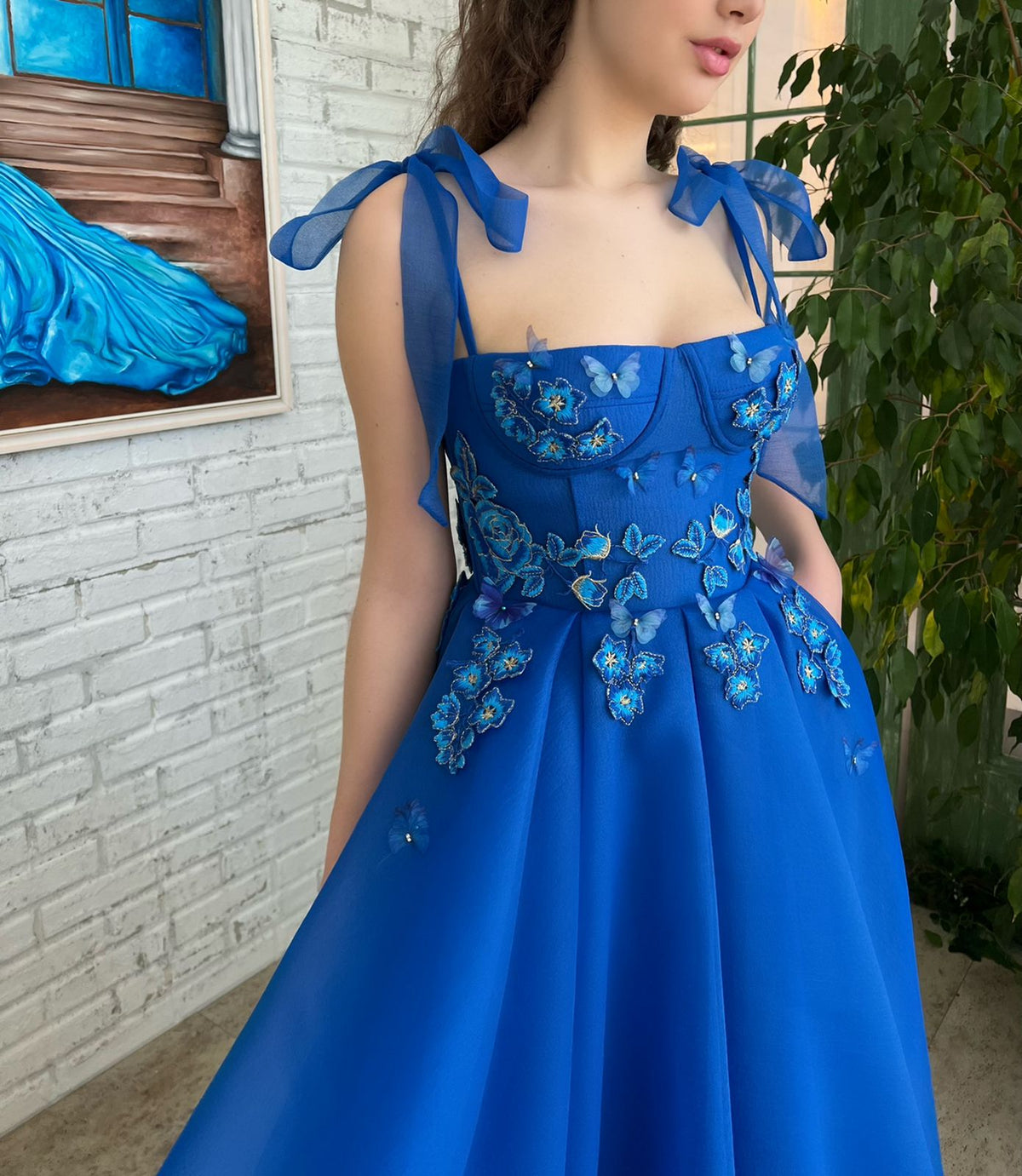 Blue midi dress with spaghetti straps, embroidery and butterflies