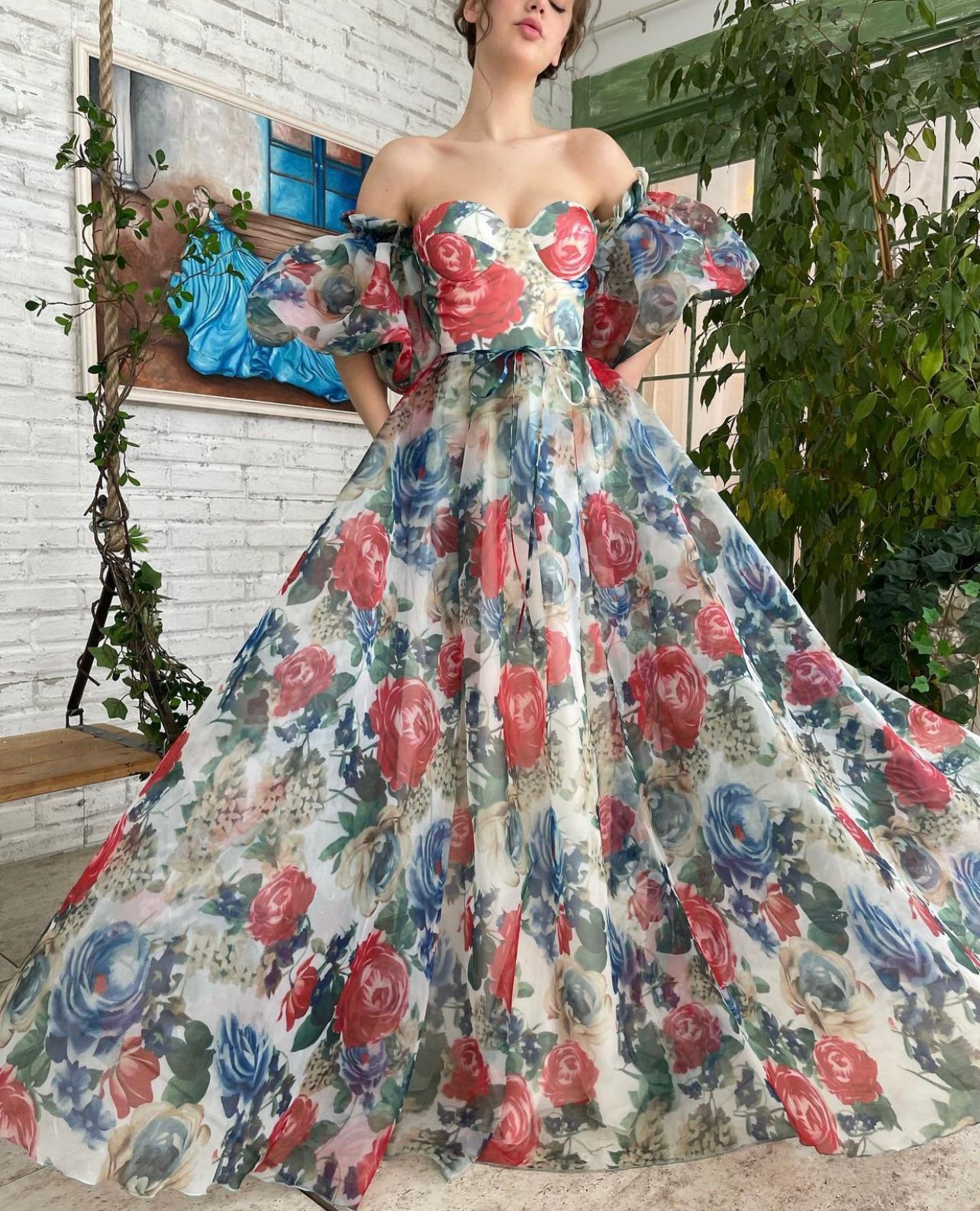 Blue and red mini dress with off the shoulder sleeves and printed flowers