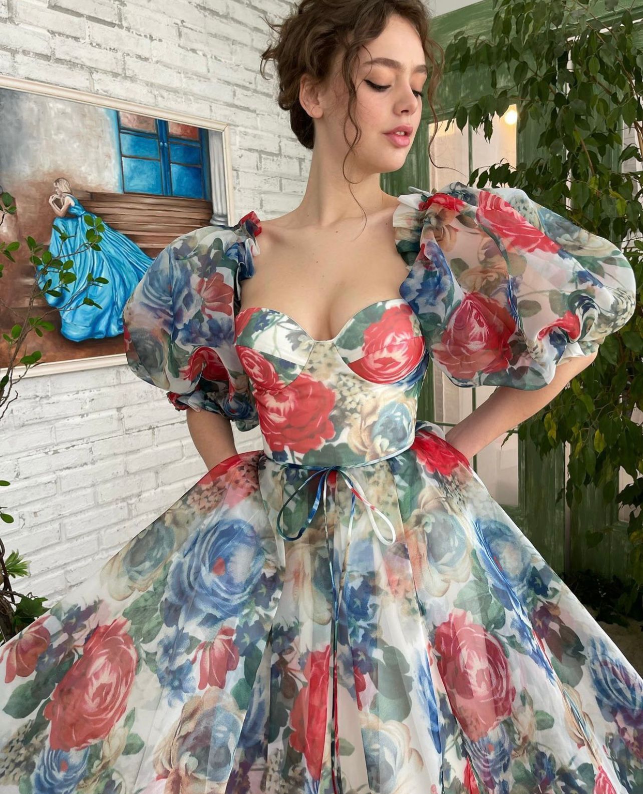 Blue and red mini dress with off the shoulder sleeves and printed flowers