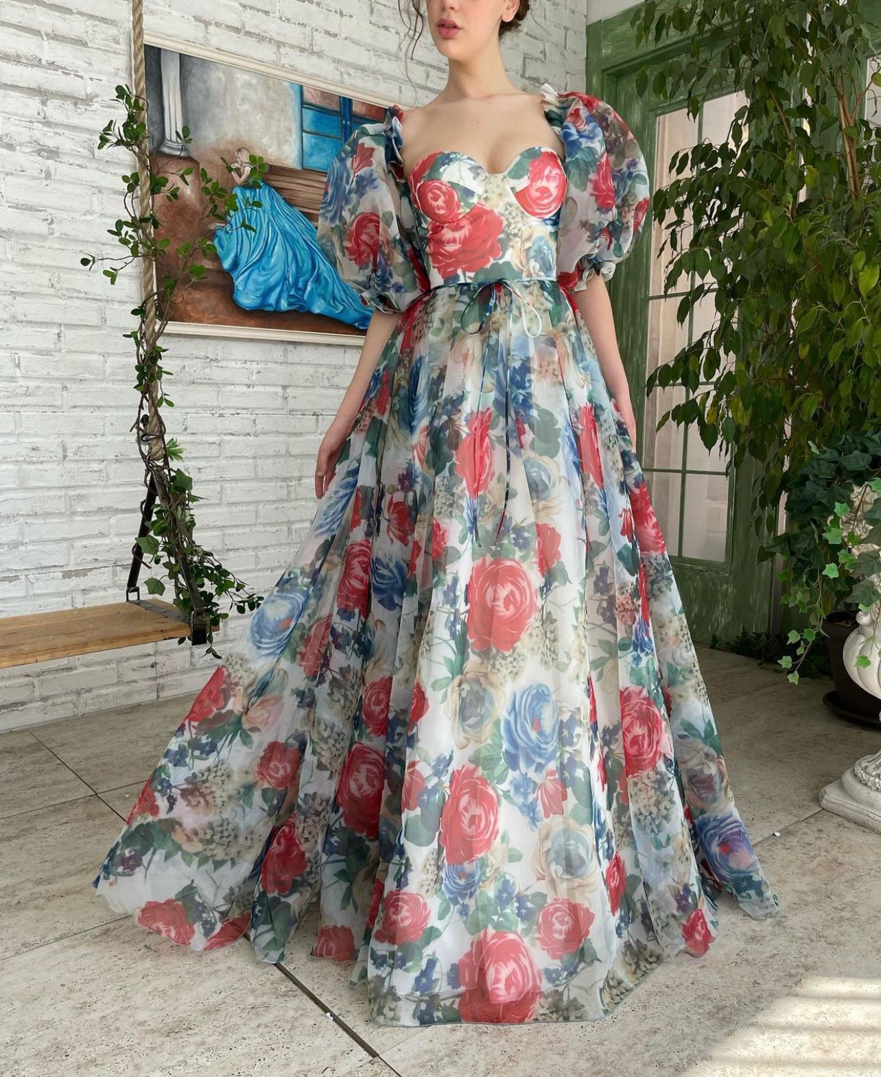 Blue and red mini dress with off the shoulder sleeves and printed flowers