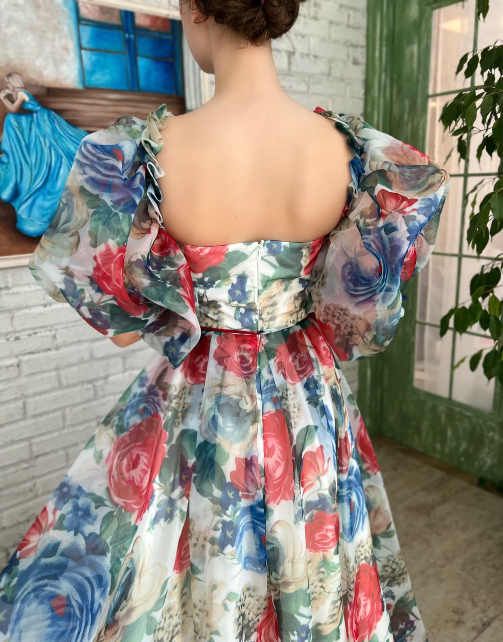 Blue and red mini dress with off the shoulder sleeves and printed flowers