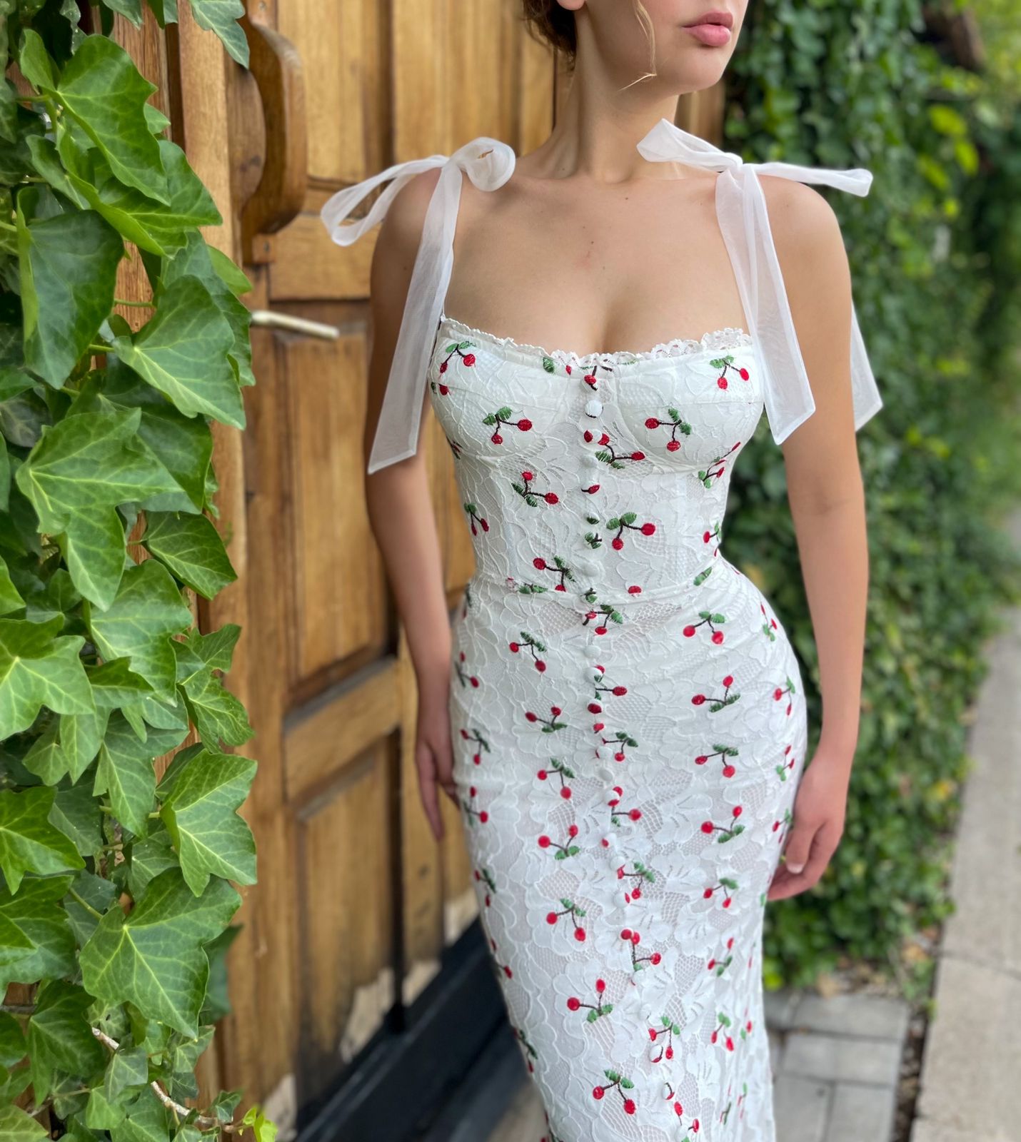 White mermaid dress with spaghetti straps and cherries