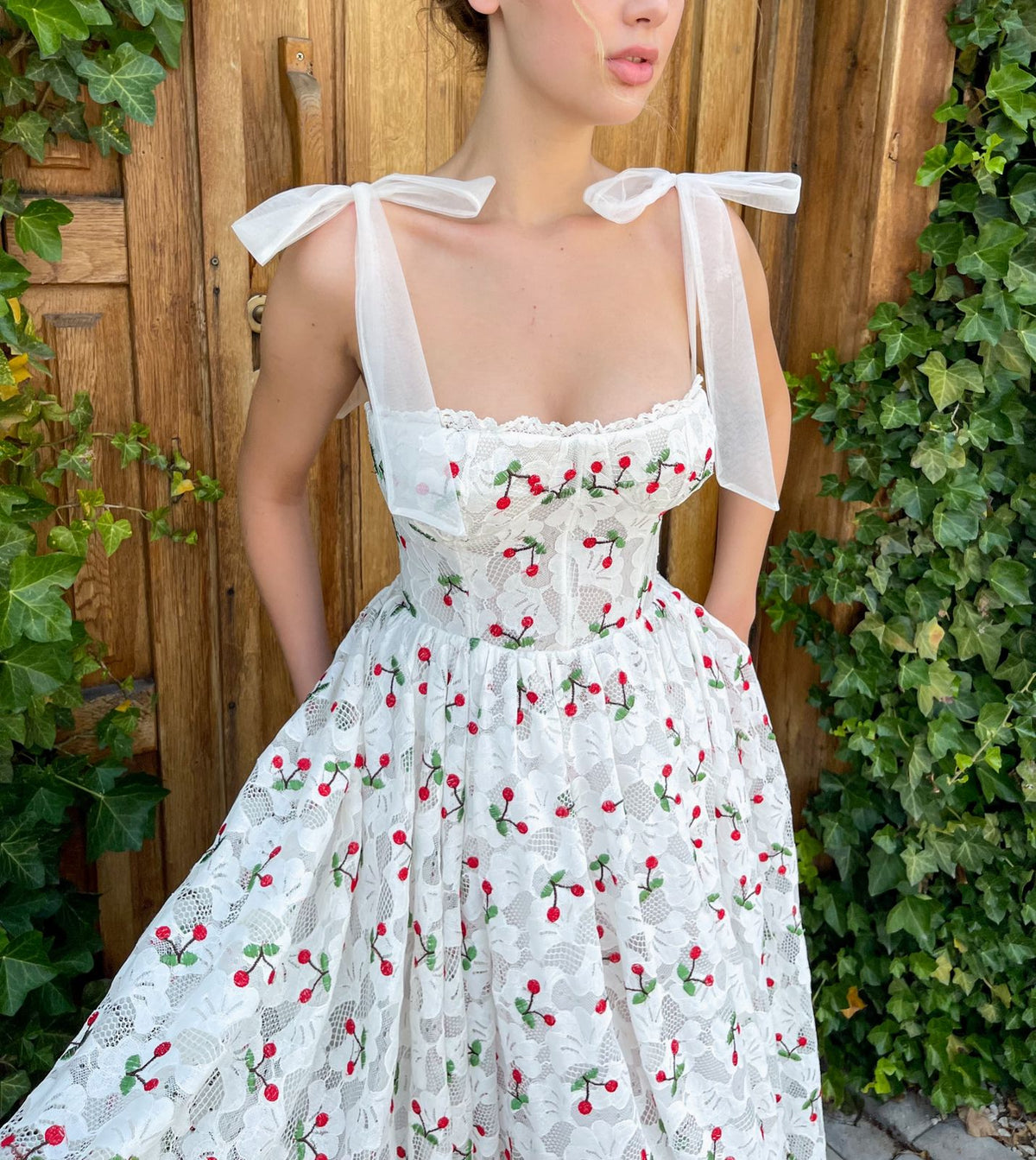 Midi white bridal dress with cherries and straps