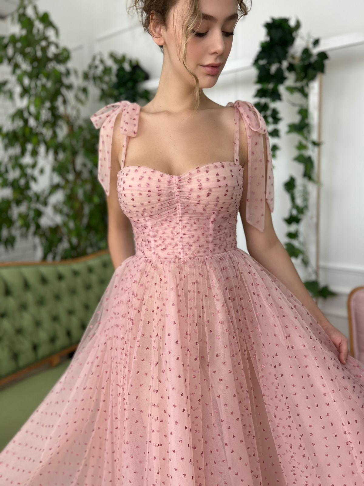 Pink midi dress with spaghetti straps and hearty fabric