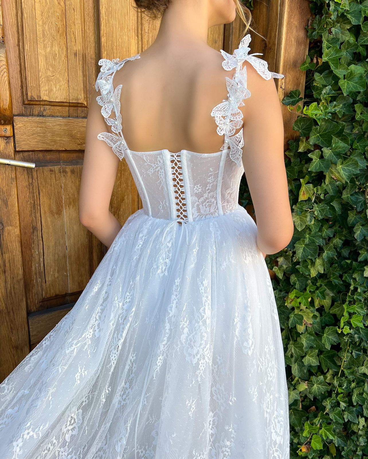 Midi white bridal dress with straps and butterflies