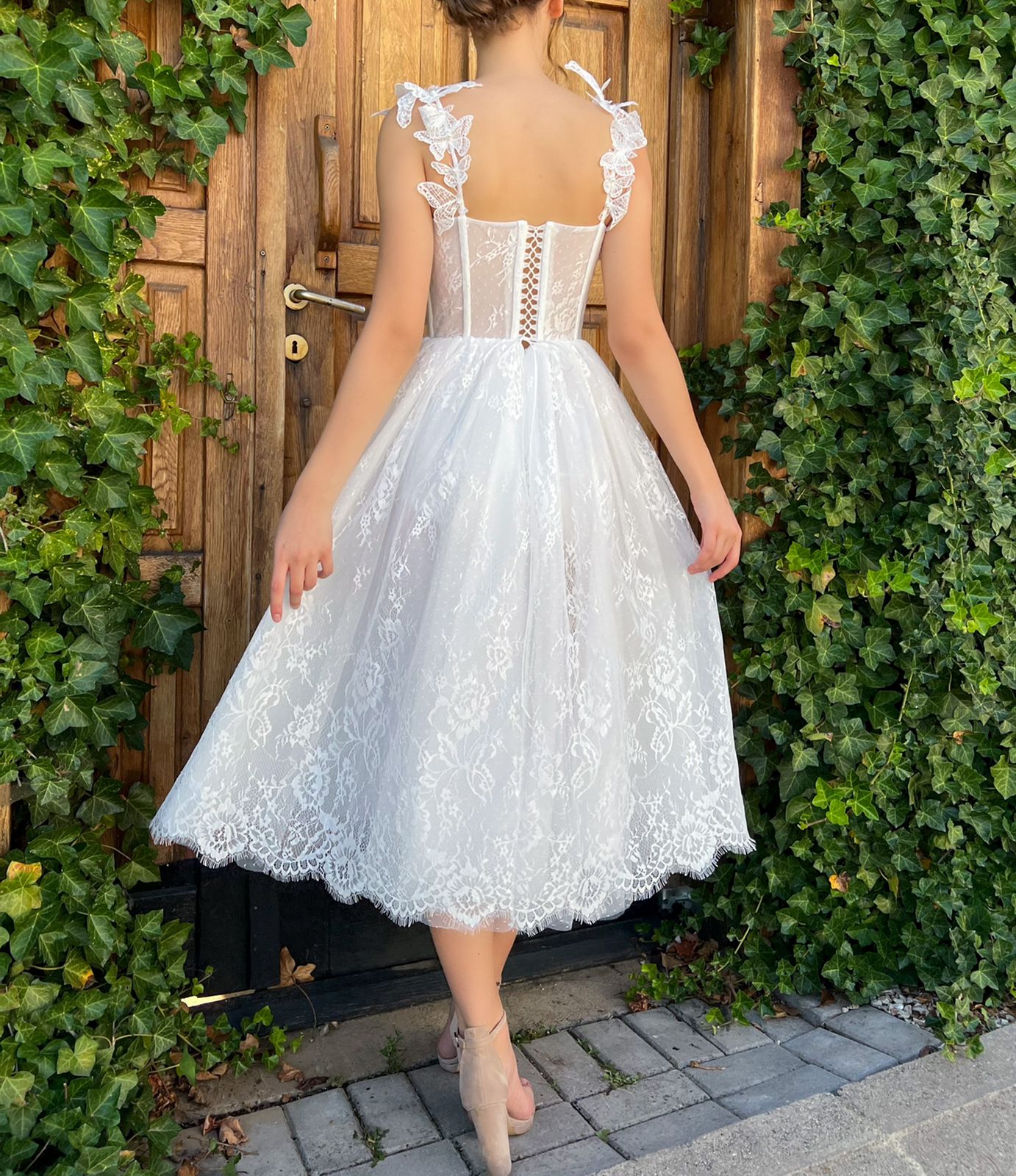 Midi white bridal dress with straps and butterflies