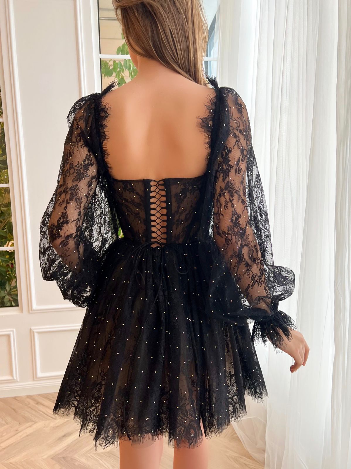 Black mini dress with long sleeves