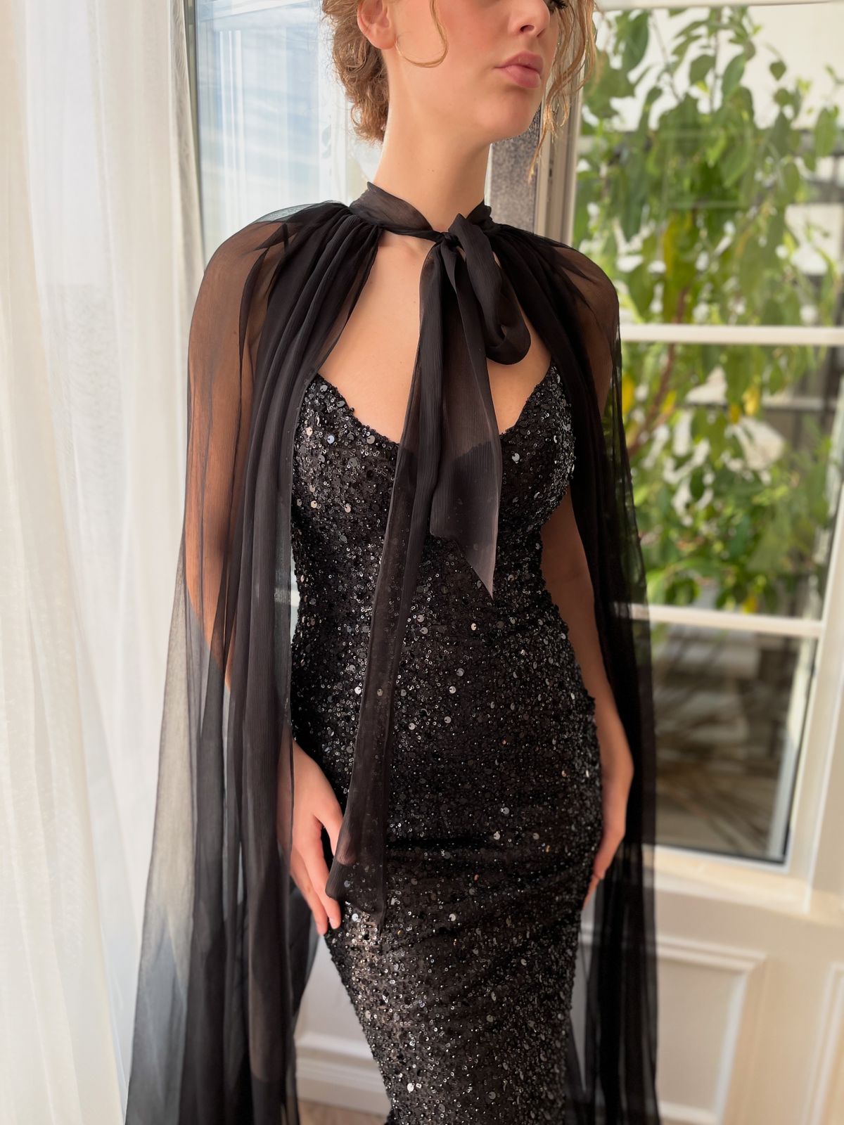 Black mermaid dress with sequins, spaghetti straps and cape