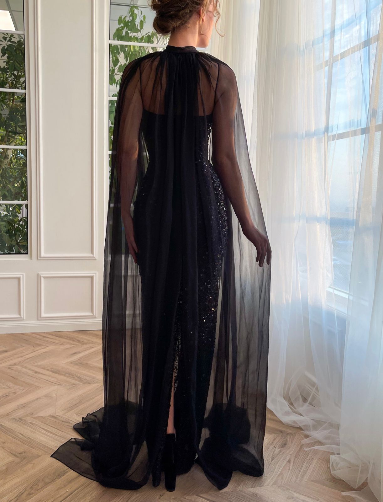 Black mermaid dress with sequins, spaghetti straps and cape
