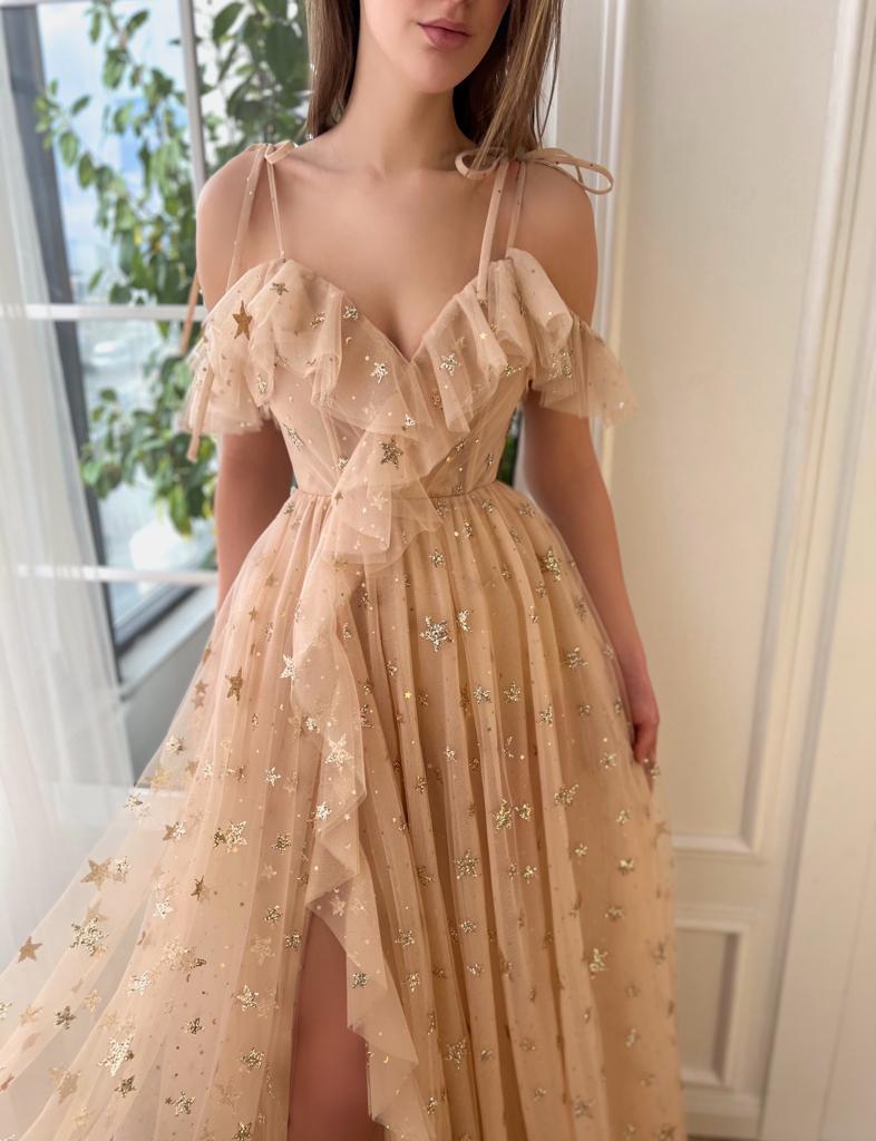 Beige A-Line dress with spaghetti straps, starry fabric and off the shoulder sleeves