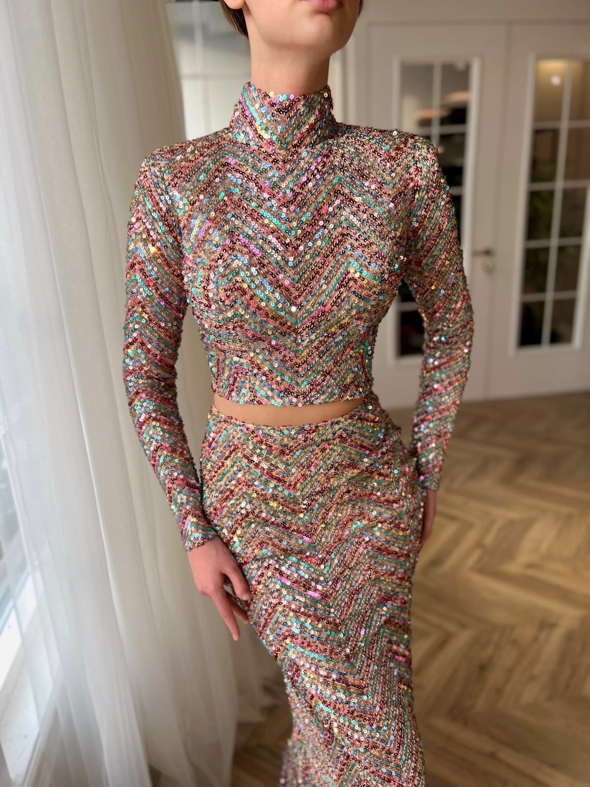 Colorful two piece dress with long sleeves, turtle neck and sequins