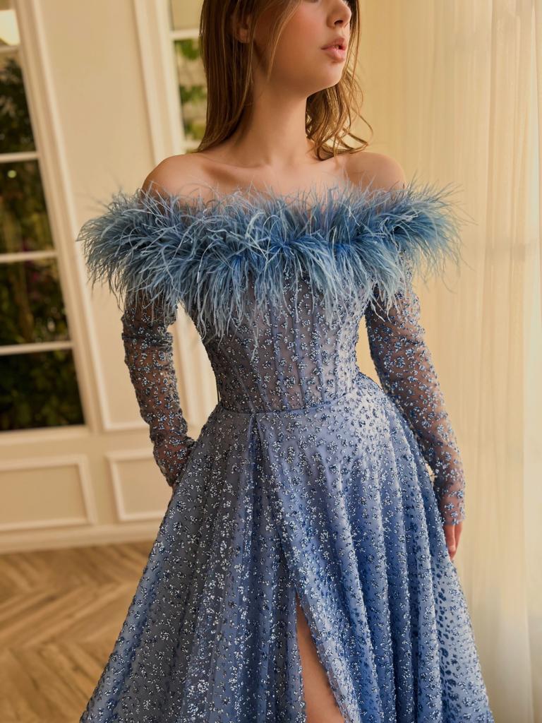 Blue A-Line dress with long off the shoulder sleeves, feathers, and beading