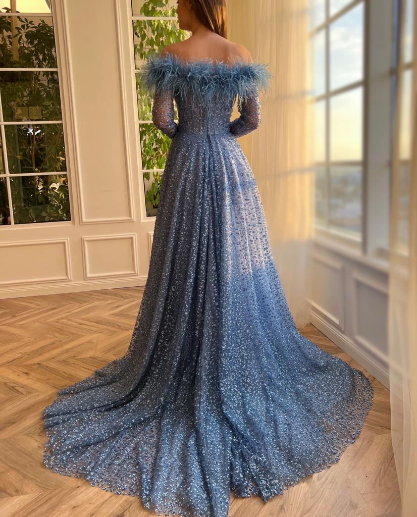 Blue A-Line dress with long off the shoulder sleeves, feathers, and beading