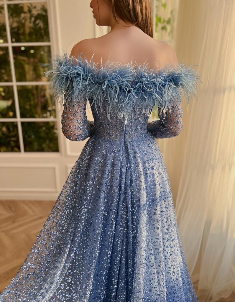 Blue A-Line dress with long off the shoulder sleeves, feathers, and beading