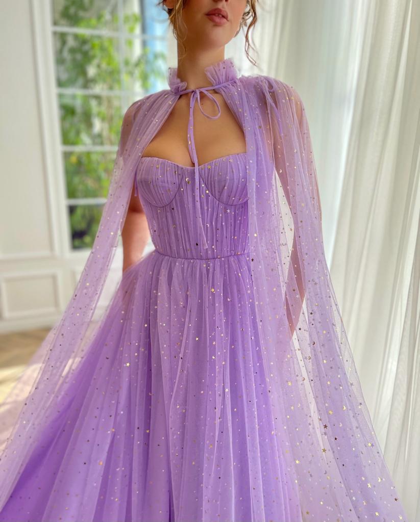 Purple A-Line dress with no sleeves, starry fabric and cape