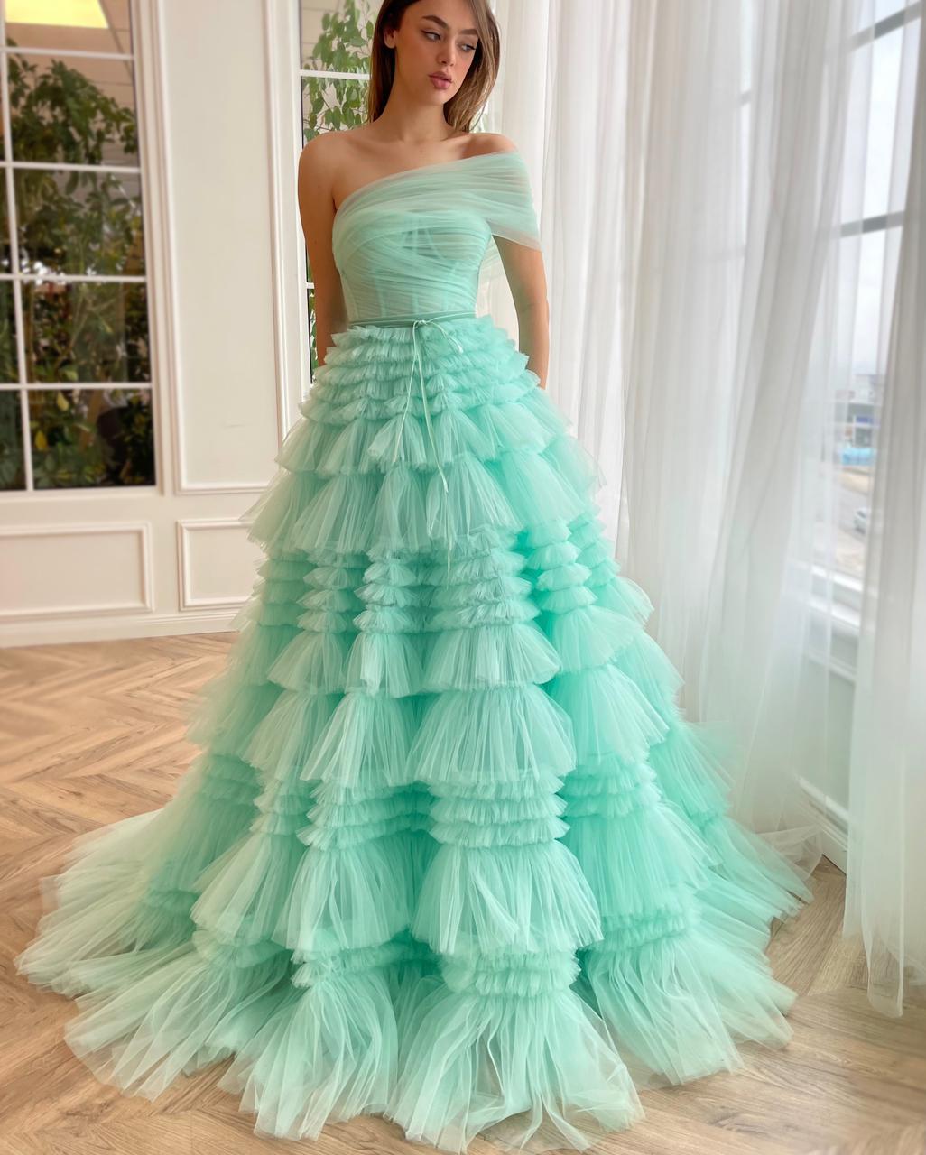 Turquoise A-Line dress with one shoulder sleeve and ruffles