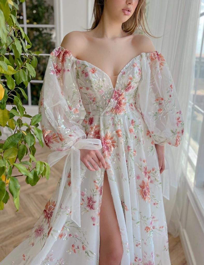 A line white bridal dress with off shoulder sleeves and embroidered flowers