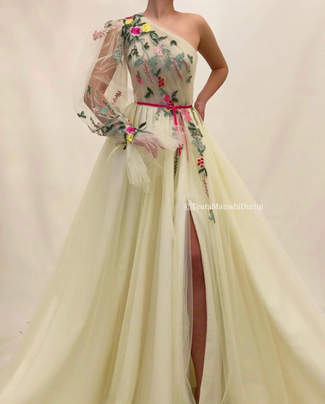 Beige A-Line dress with one long sleeve and embroidery