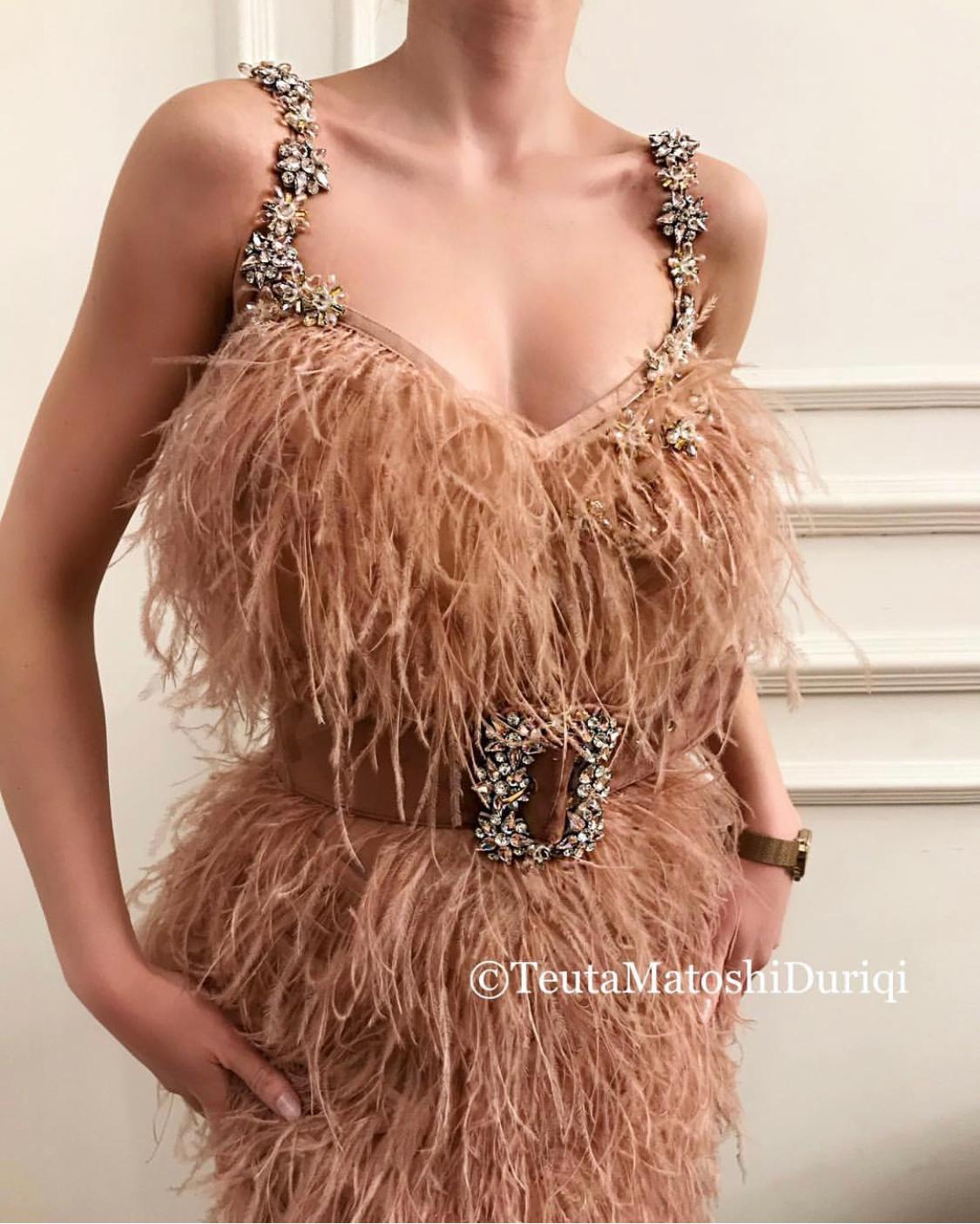 Pink mermaid dress with embroidery, straps and feathers