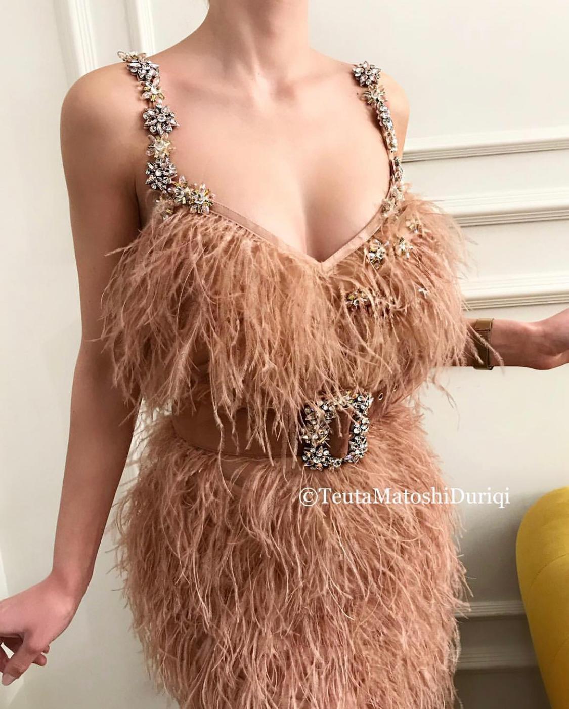Pink mermaid dress with embroidery, straps and feathers
