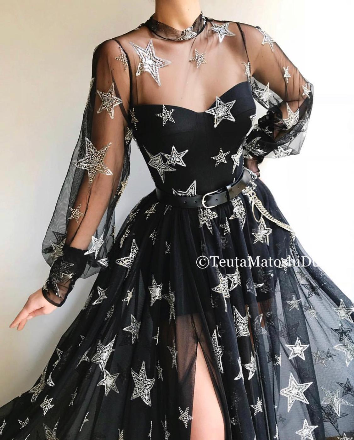 Black A-Line dress with belt, long sleeves and starry fabric