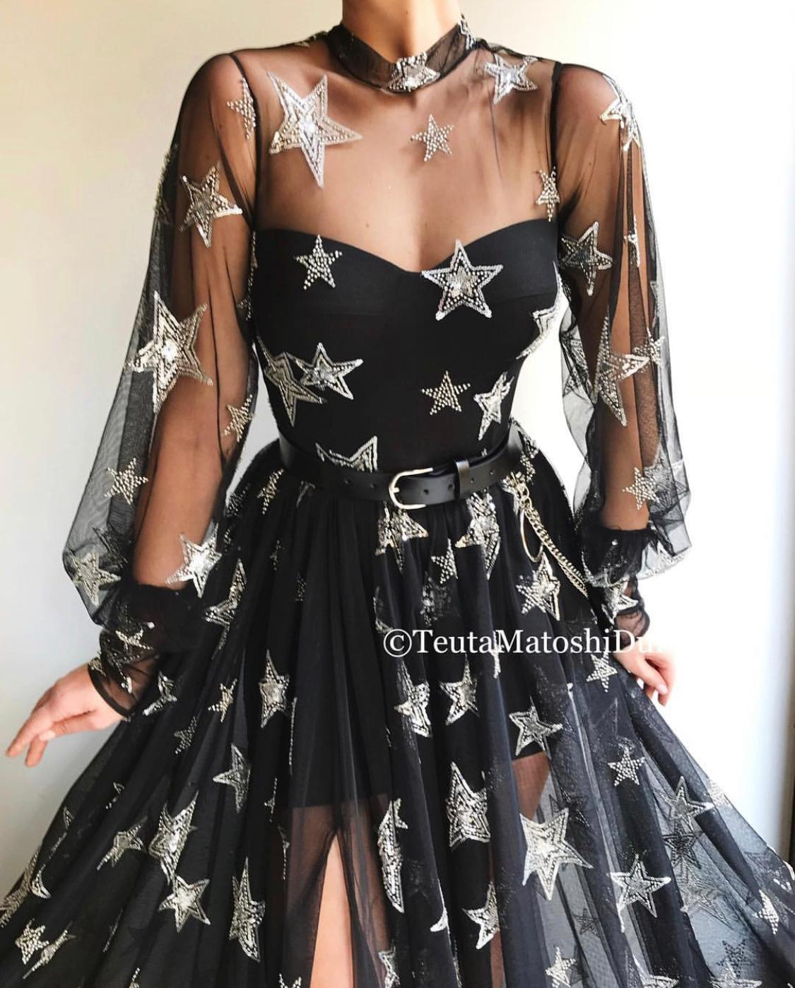 Black A-Line dress with belt, long sleeves and starry fabric