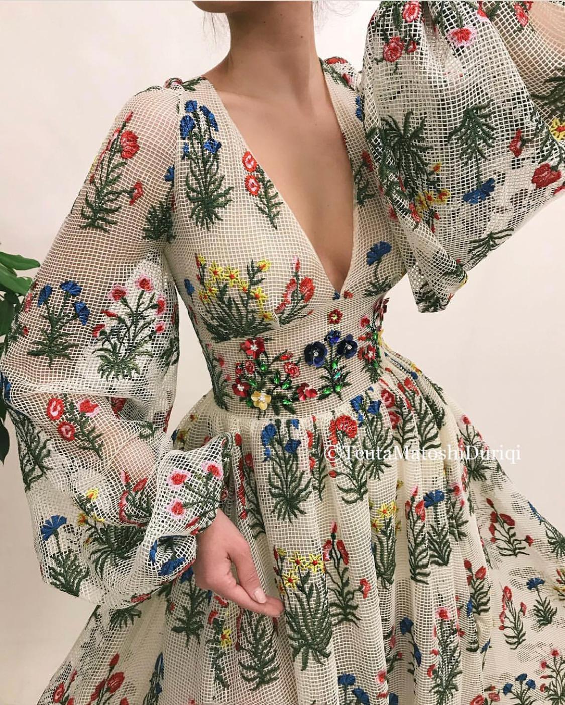 White A-Line dress with v-neck, long sleeves and embroidery