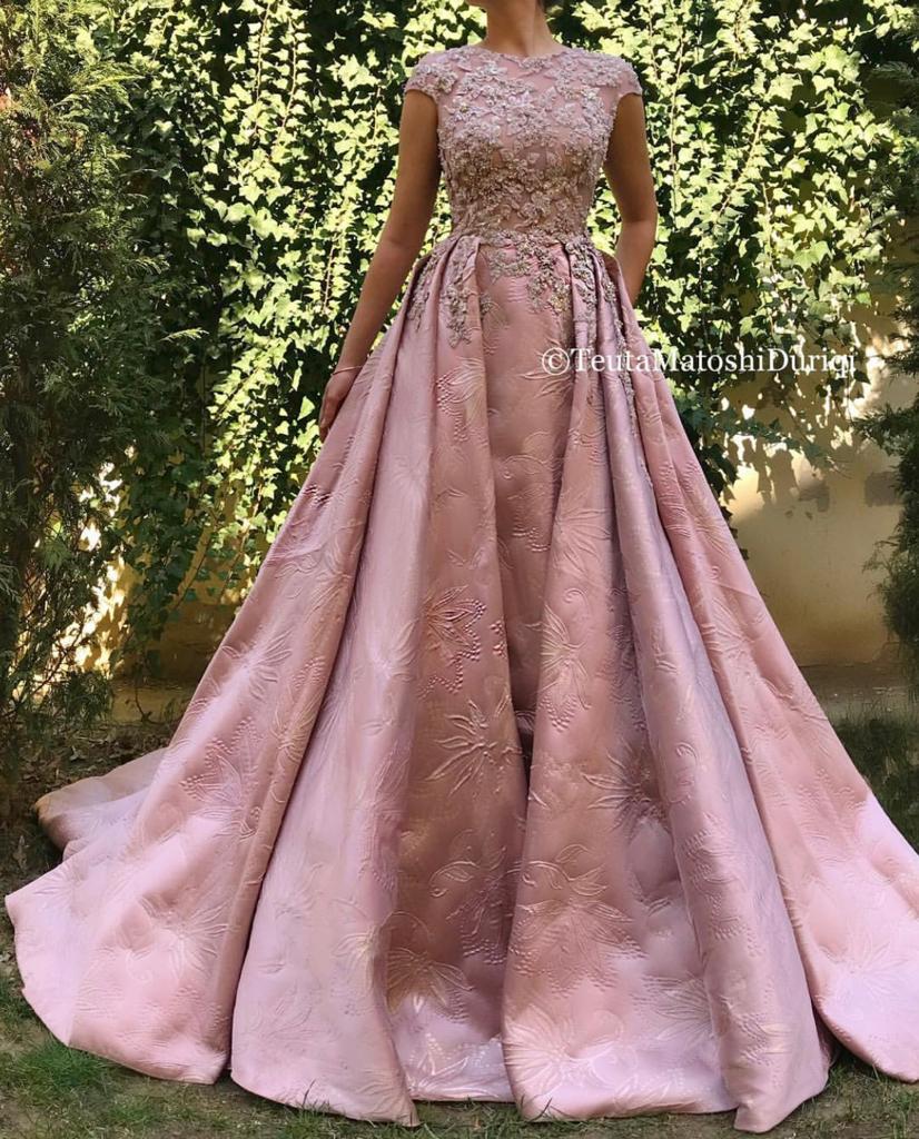Pink overskirt dress with embroidery and no sleeves
