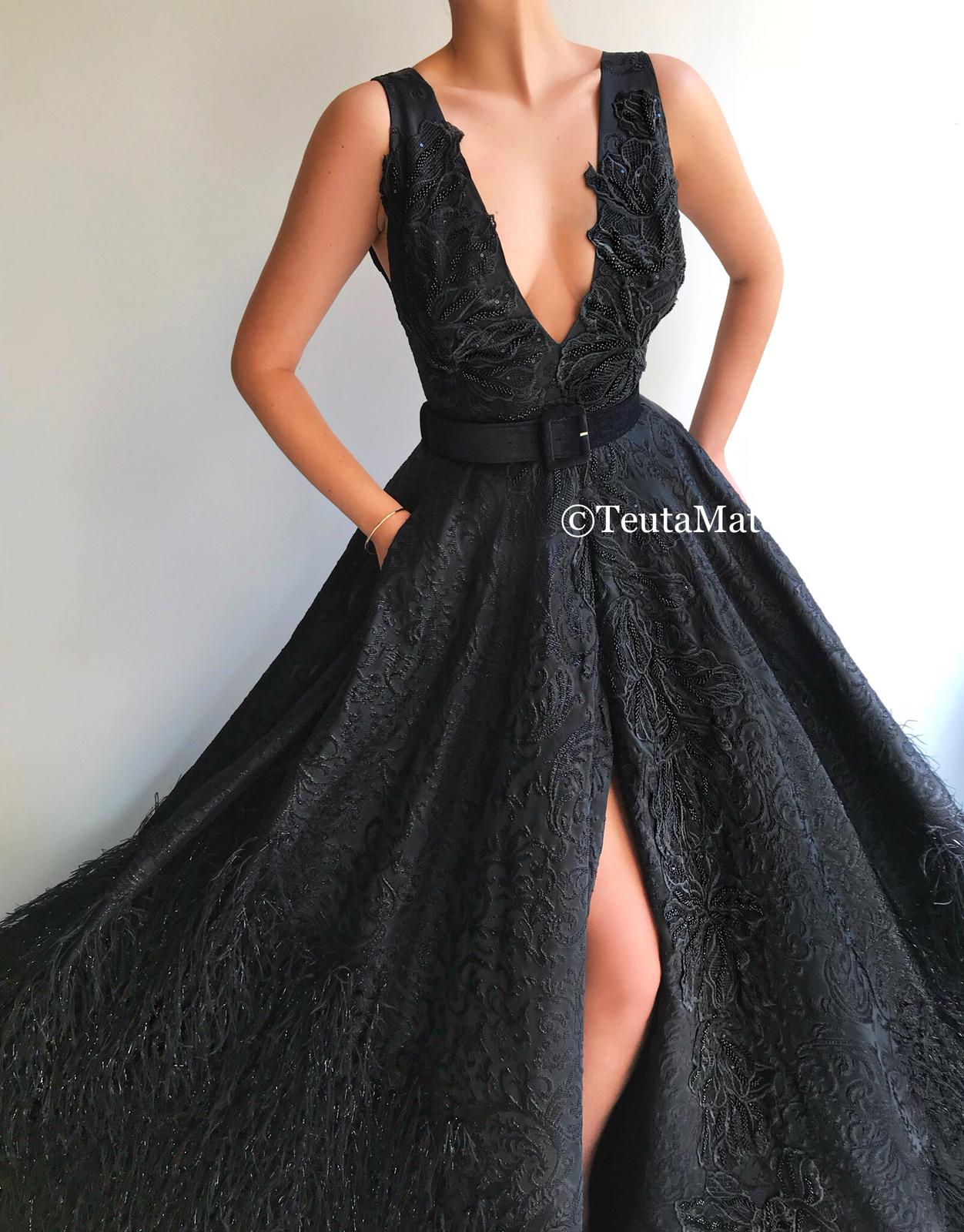 Black A-Line dress with v-neck, no sleeves and embroidery