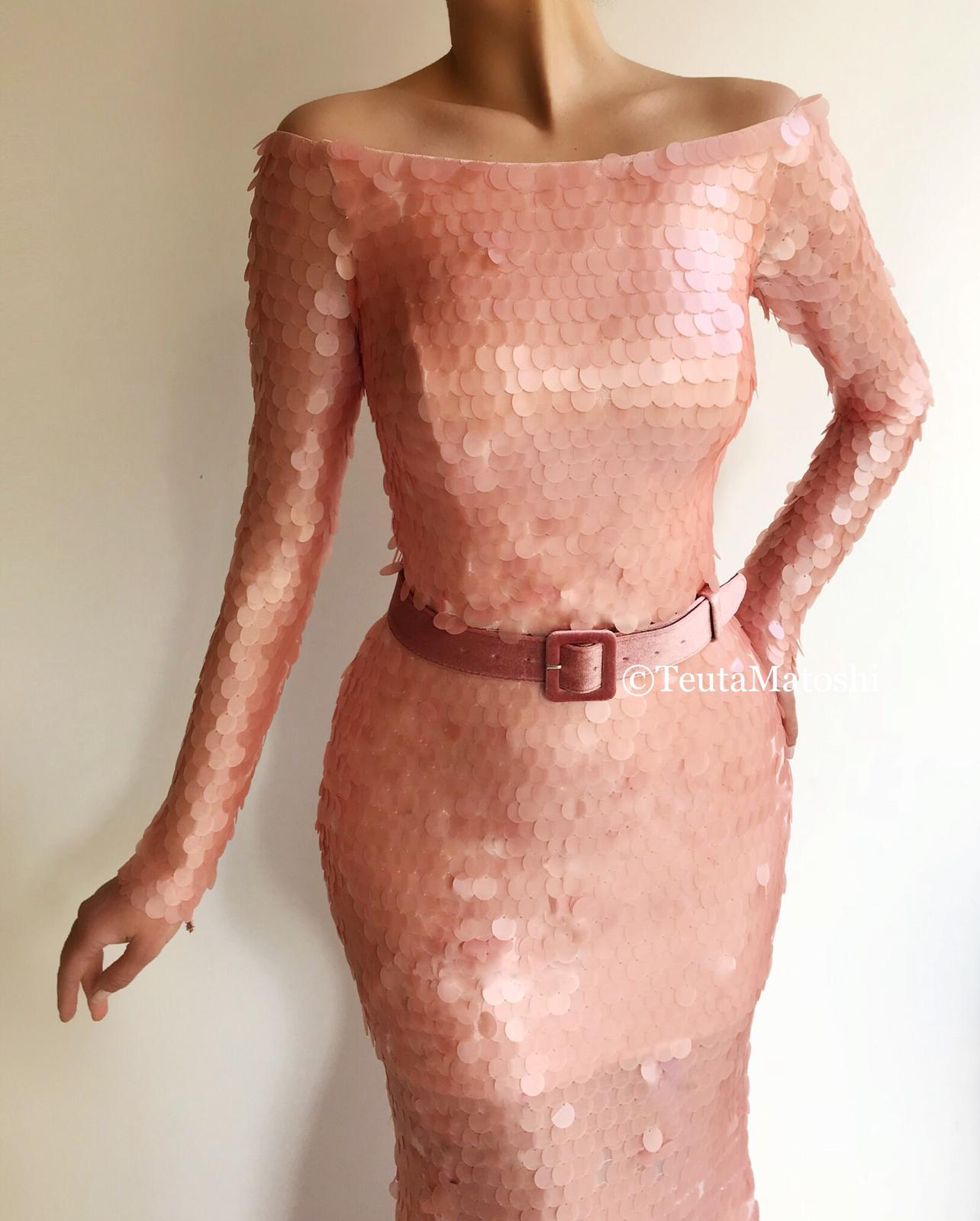 Pink mermaid dress with belt, sequins and long off the shoulder sleeves