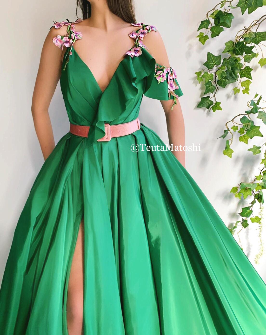 Green A-Line dress with one off the shoulder sleeve, straps, belt and embroidery