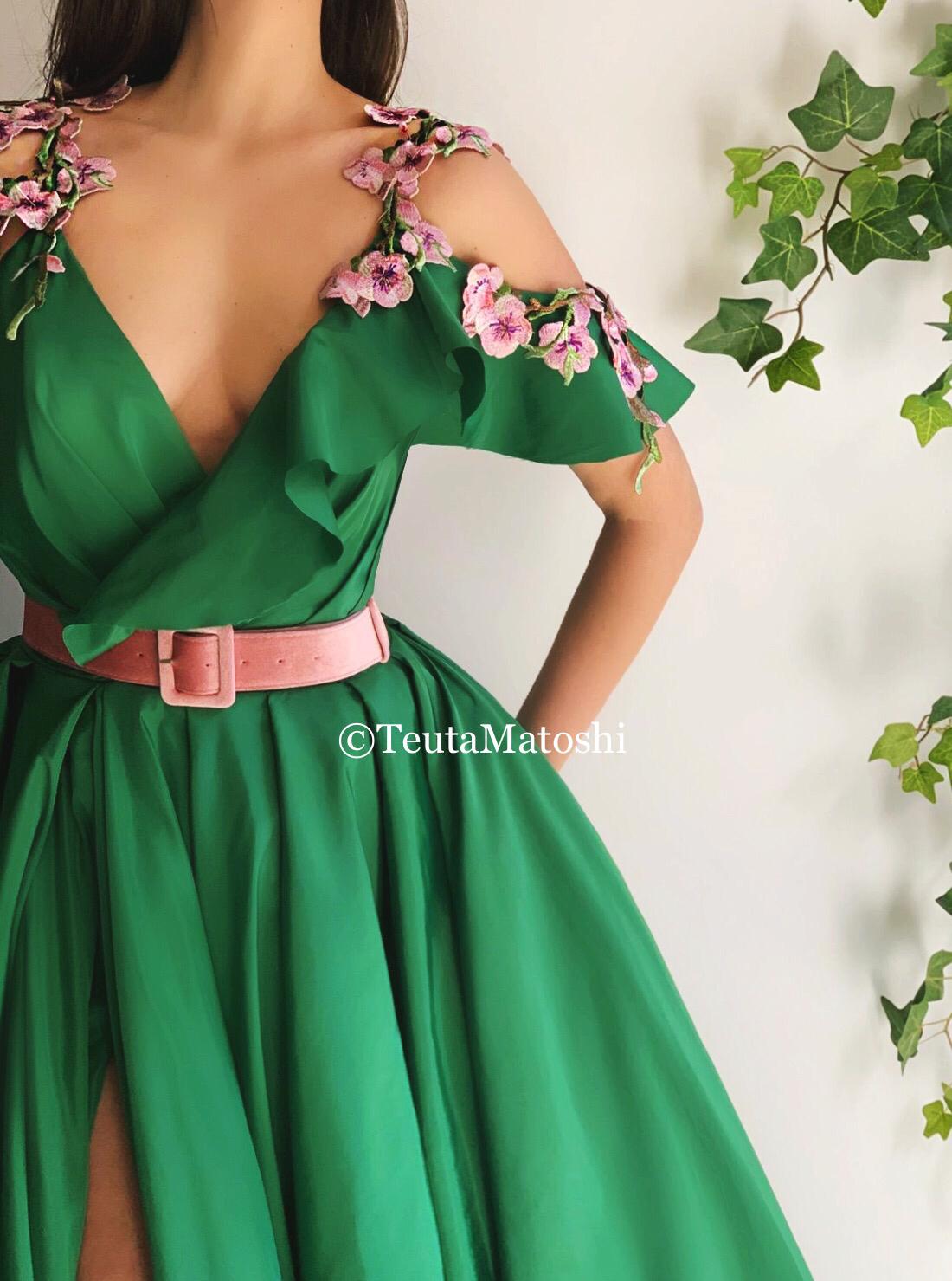 Green A-Line dress with one off the shoulder sleeve, straps, belt and embroidery