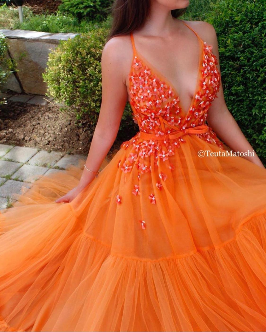 Orange A-Line dress with v-neck, spaghetti straps and embroidery