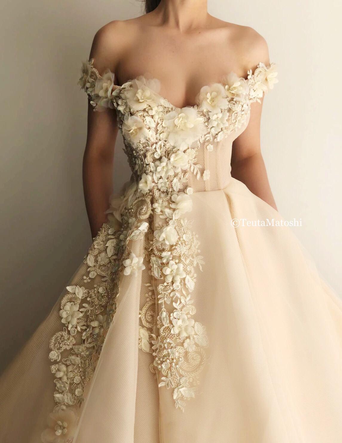 Beige A-Line dress with off the shoulder sleeves and embroidery