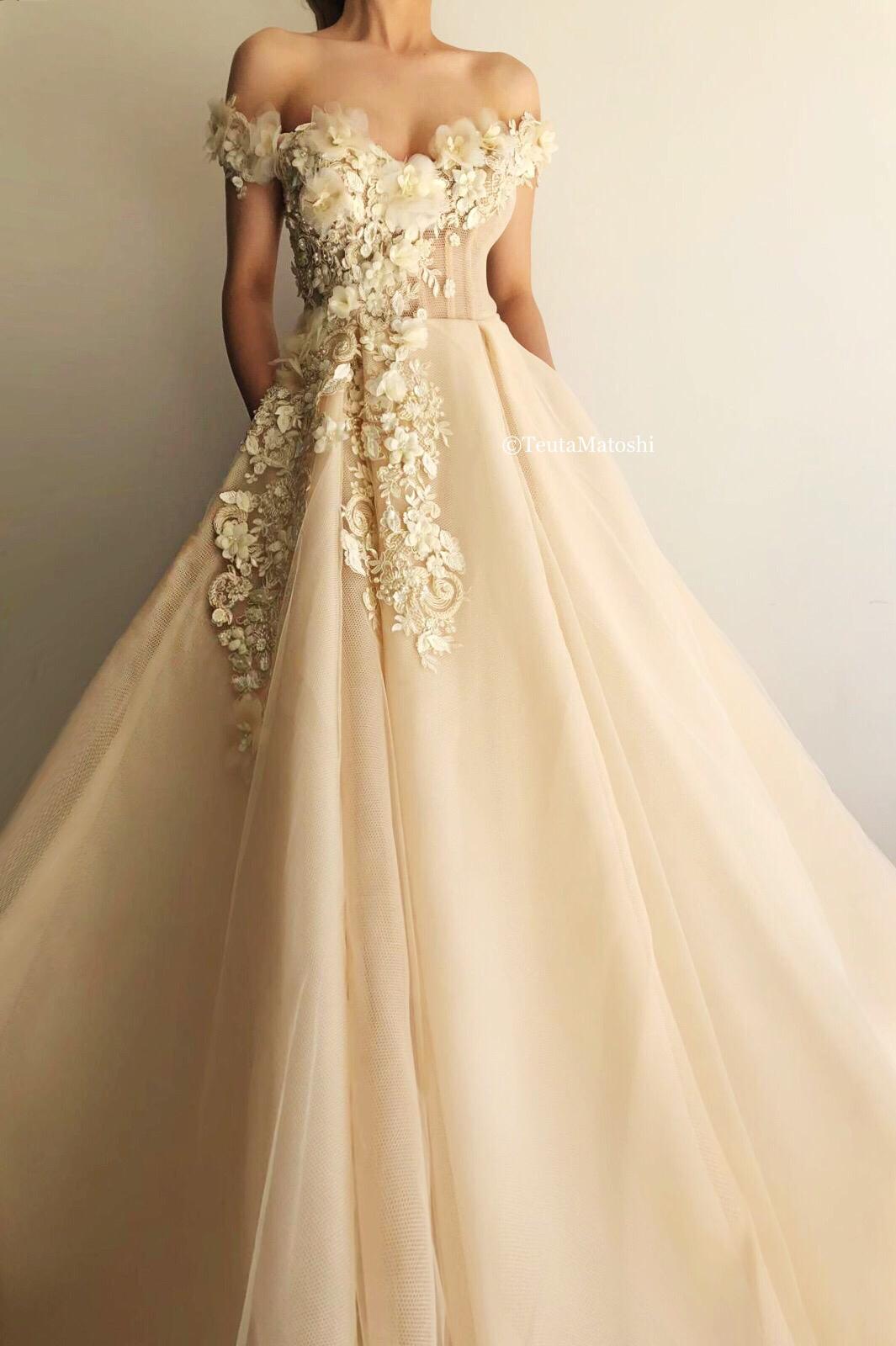 Beige A-Line dress with off the shoulder sleeves and embroidery