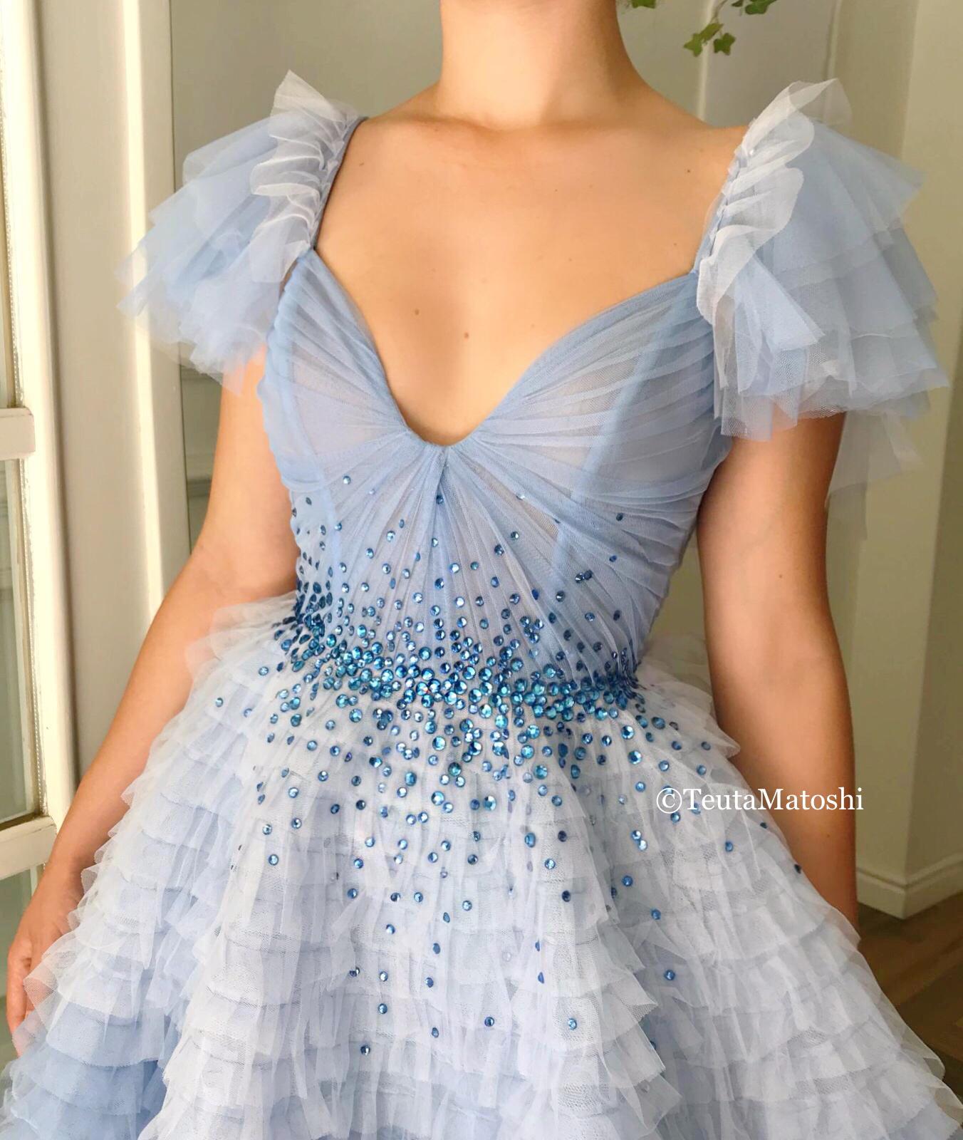 Blue A-Line dress with no sleeves and embroidery