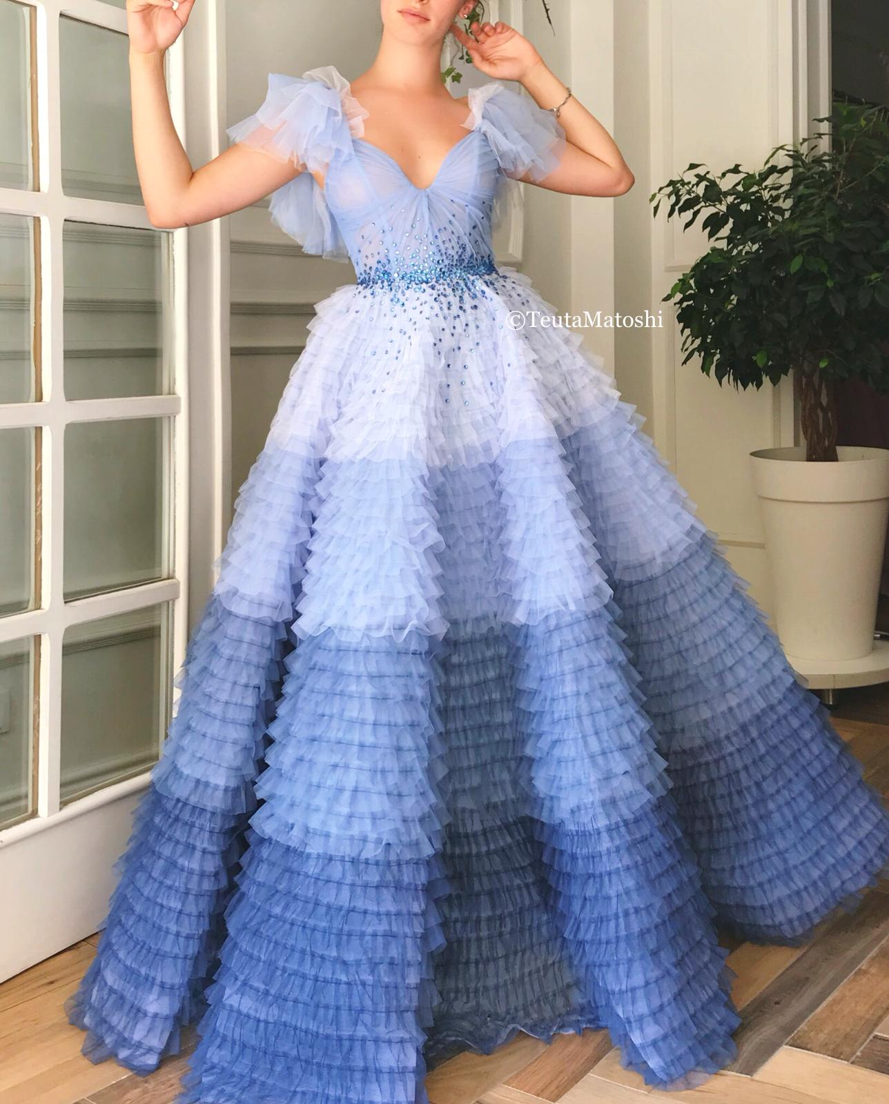 Blue A-Line dress with no sleeves and embroidery