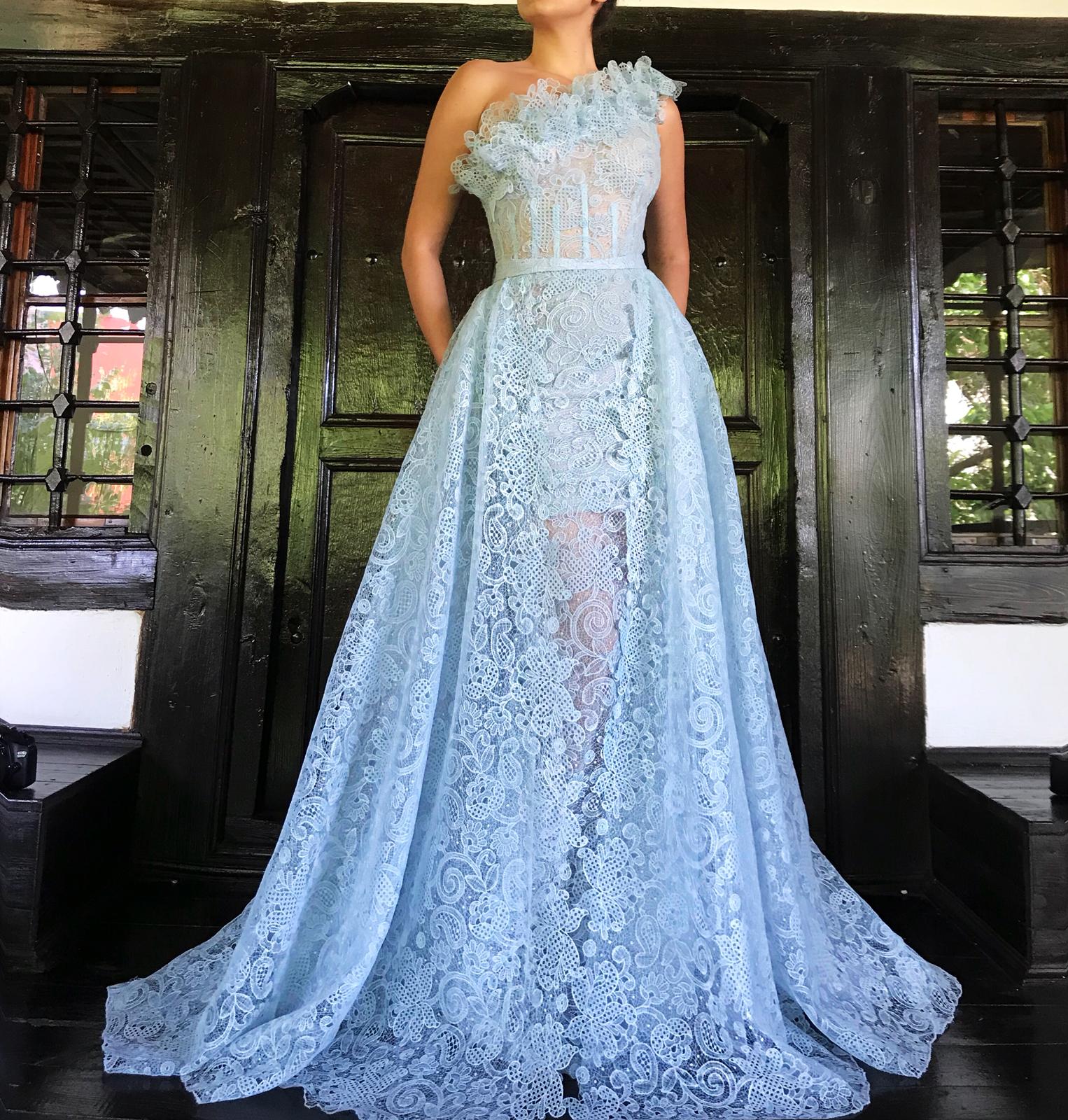 Blue overskirt dress with one shoulder sleeve and lace