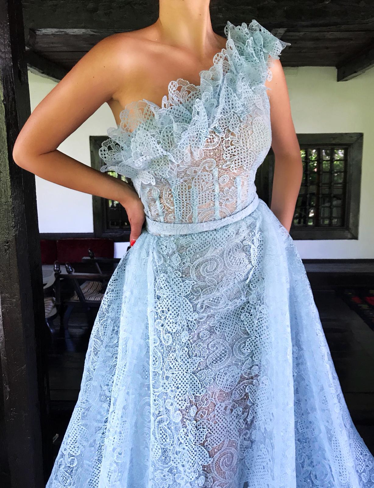 Blue overskirt dress with one shoulder sleeve and lace