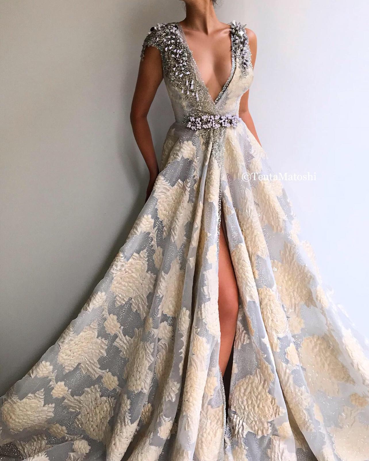 Grey A-Line dress with v-neck, no sleeves and embroidery