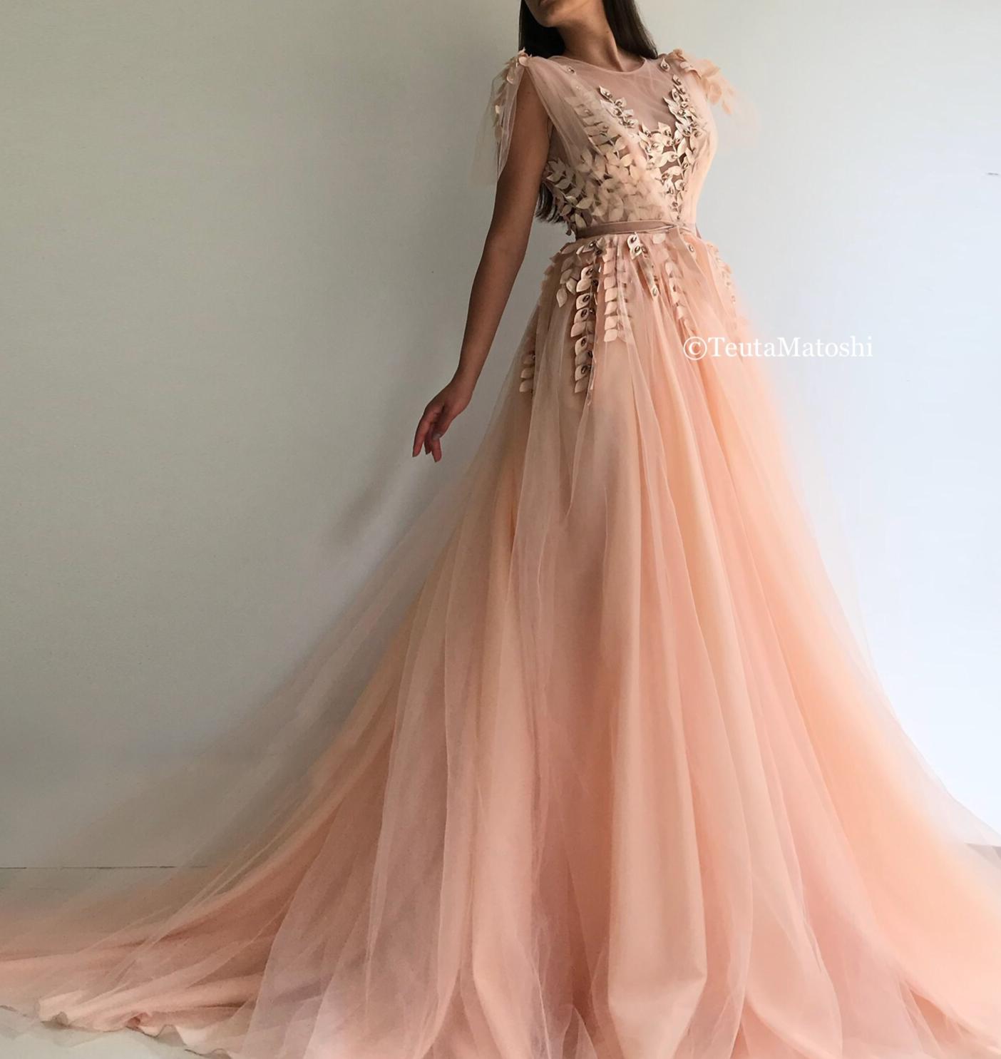 Peach A-Line dress with no sleeves and embroidery