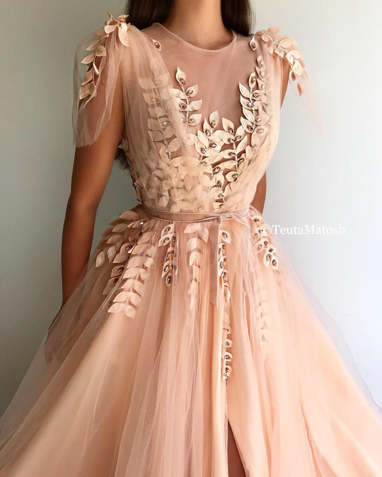 Peach A-Line dress with no sleeves and embroidery