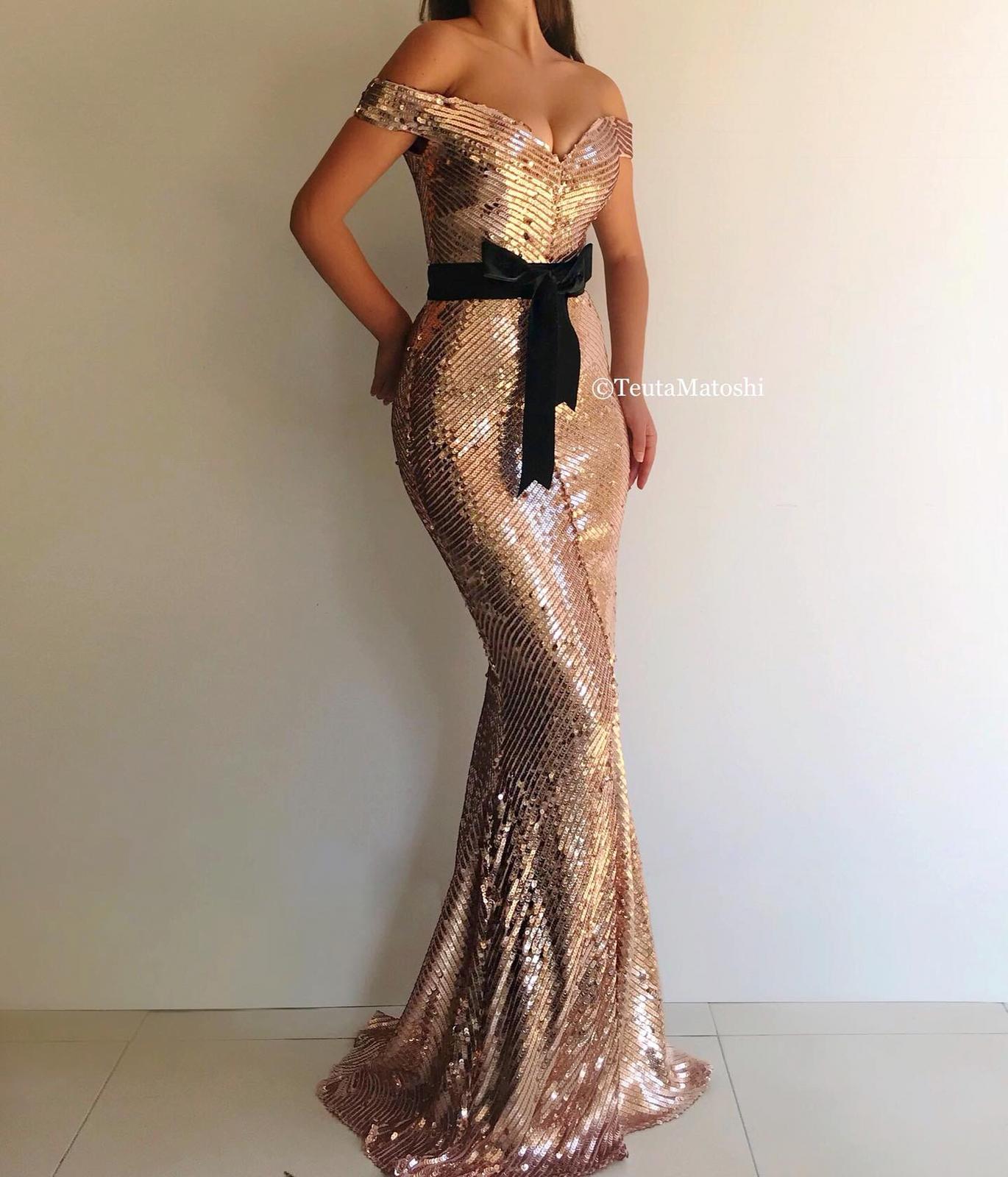 Gold mermaid dress with off the shoulder sleeves and sequins
