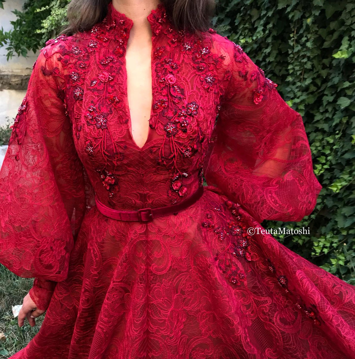 Red A-Line dress with belt, v-neck, long sleeves and embroidery