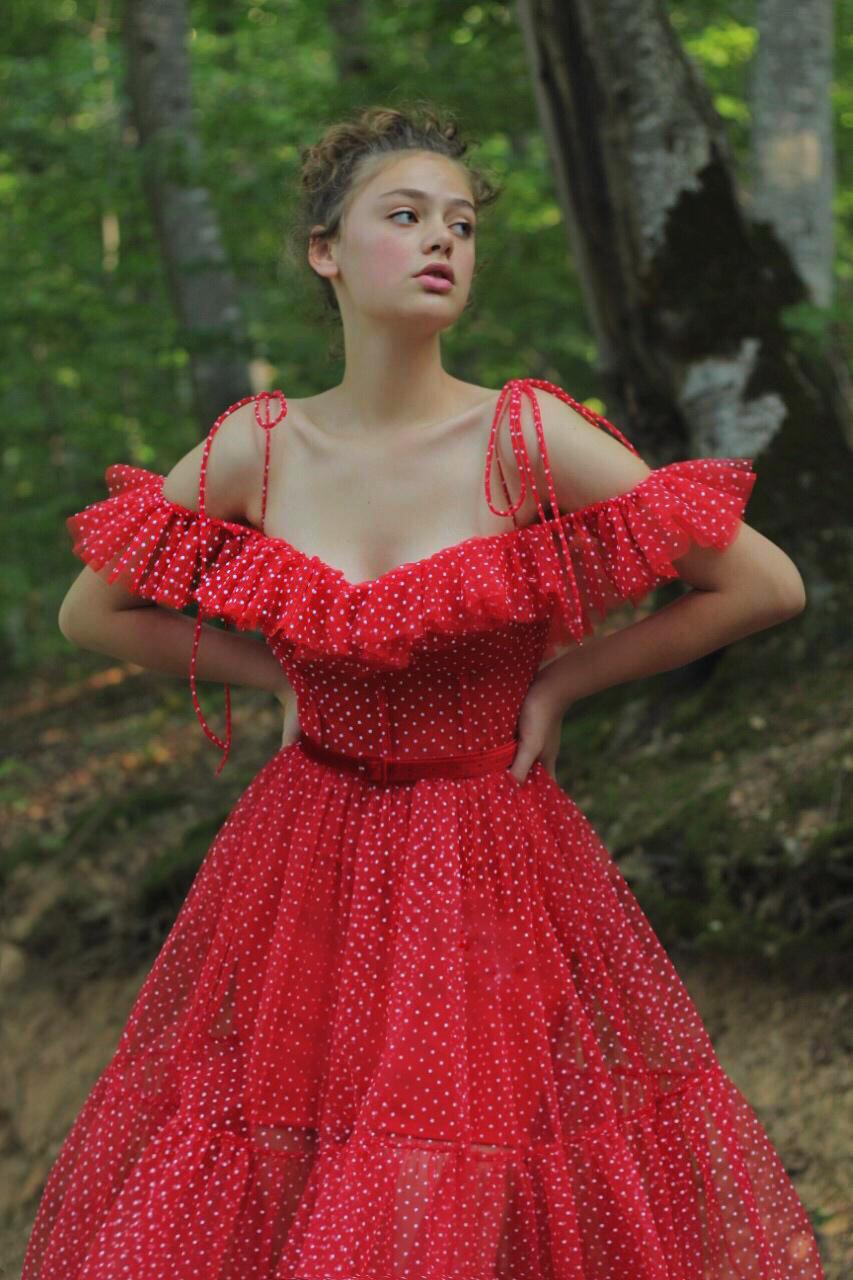 Red A-Line dress with dotted fabric, spaghetti straps and off the shoulder sleeves