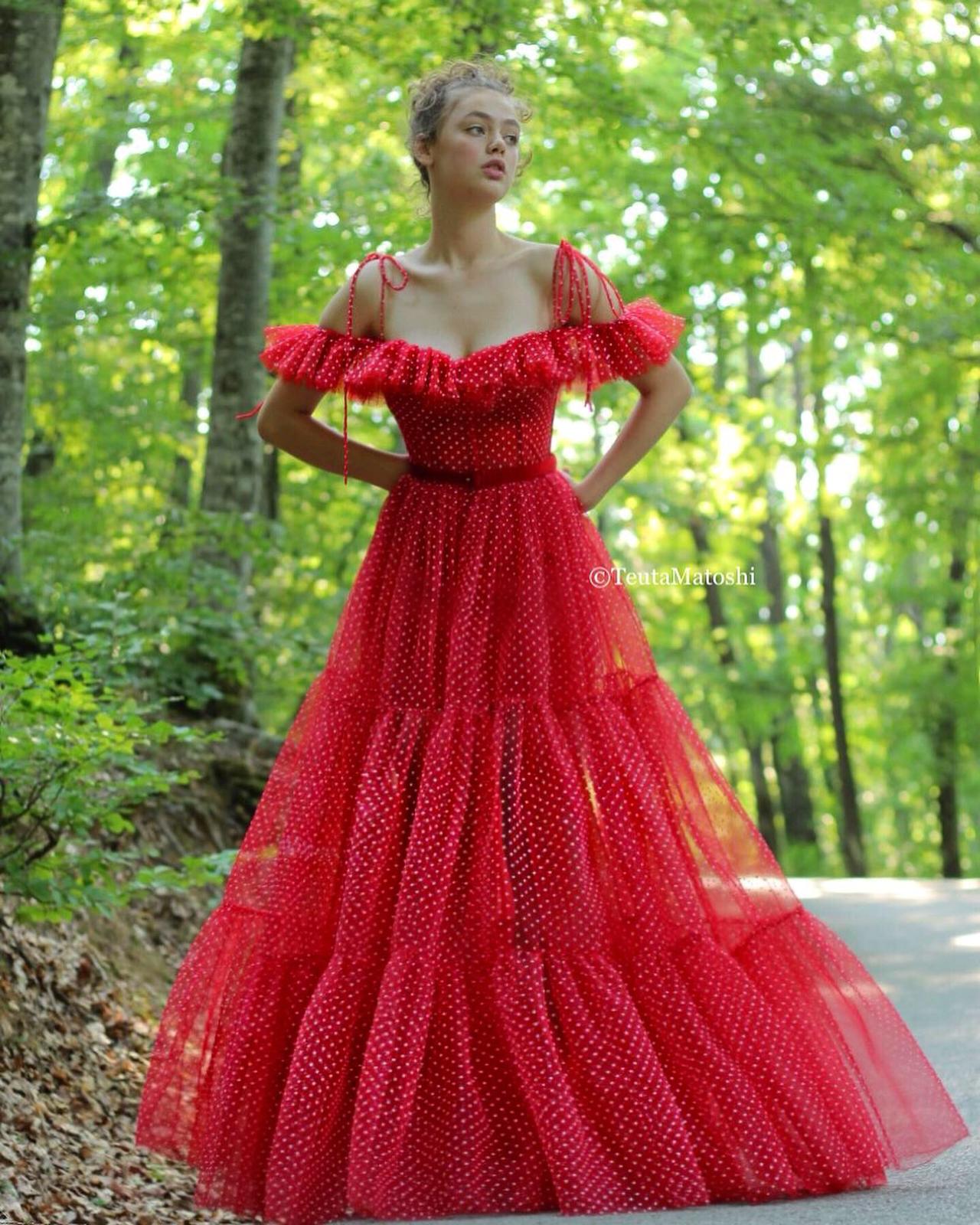 Red A-Line dress with dotted fabric, spaghetti straps and off the shoulder sleeves
