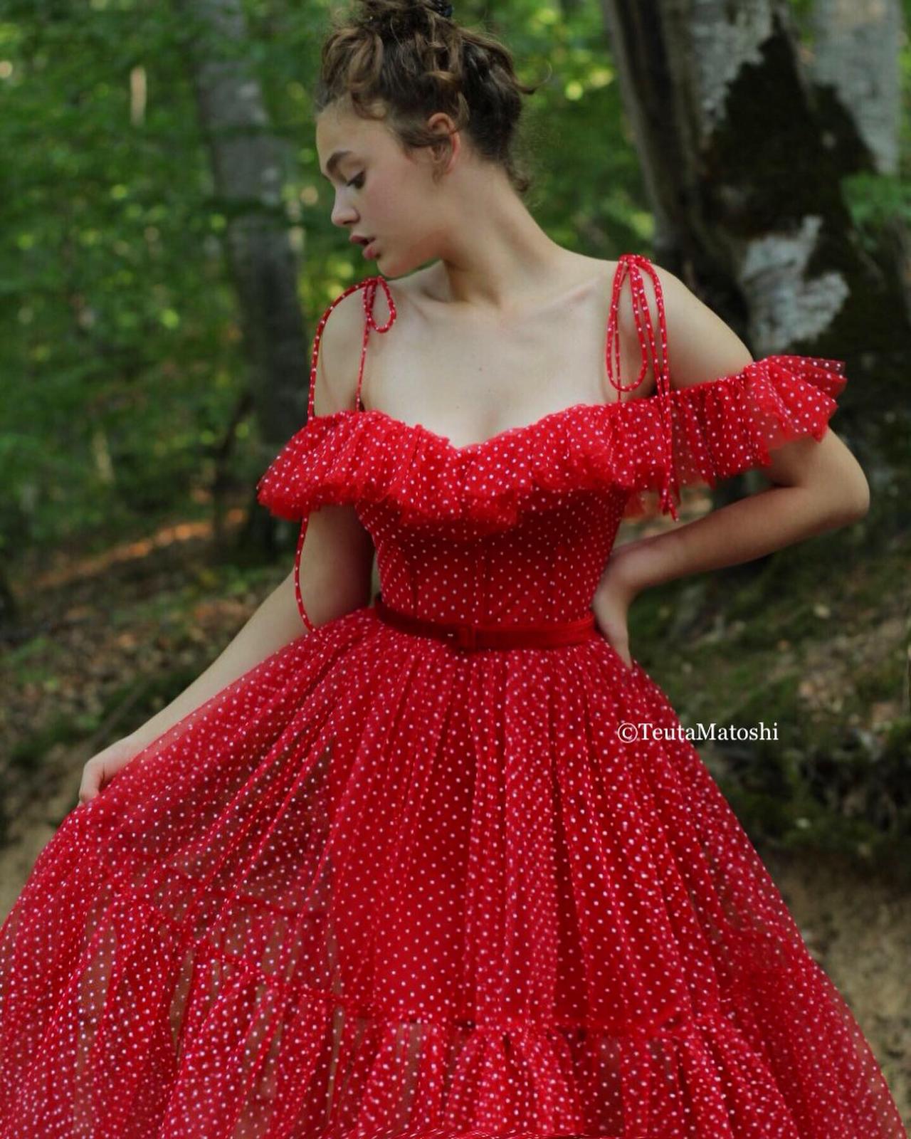Red A-Line dress with dotted fabric, spaghetti straps and off the shoulder sleeves