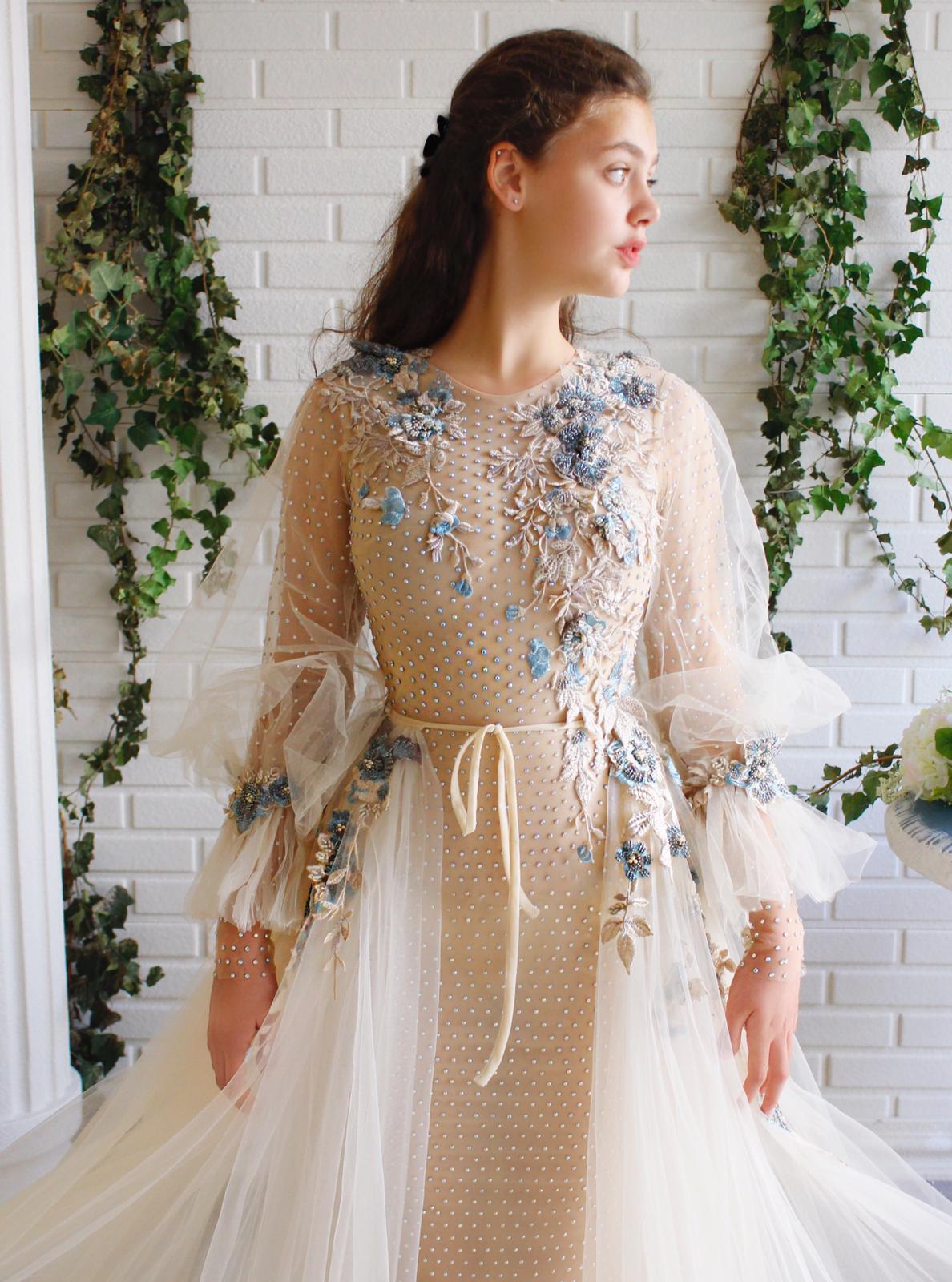 Beige overskirt dress with long sleeves and embroidery