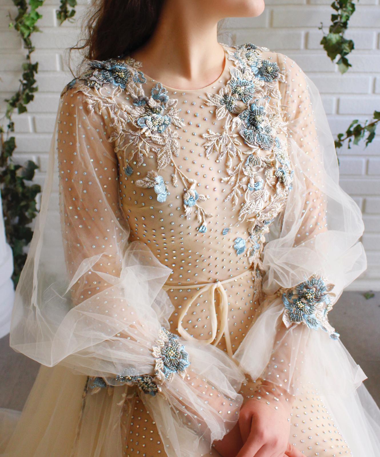 Beige overskirt dress with long sleeves and embroidery