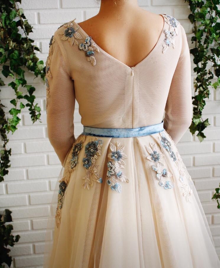 Beige A-Line dress with long sleeves, embroidery, belt and v-neck